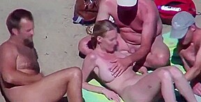 Beautiful bitch groped by his husband and strangers at beach