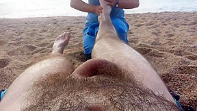 Nude massage on the beach