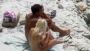 Slim blonde gets fucked with her boyfriend at a public beach